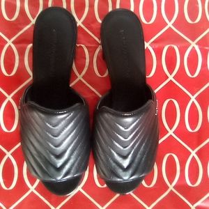 A Pair Of Karl Lagerfeld Slides